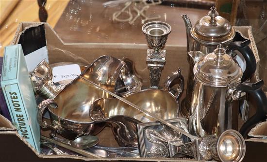 An Edwardian cream jug, a tea strainer and stand and sundry plated wares.